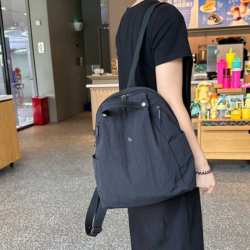 Review Mochila esportiva casual e elegante, mochila escolar versátil para estudantes, mochila de viagem ultraleve e impermeável: Vale a Pena em 2026?